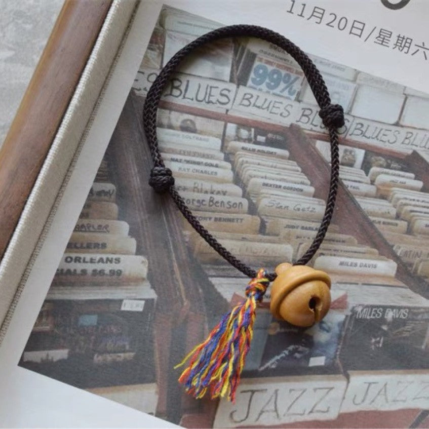 Mahogany Bell Colorful Rope Bracelet